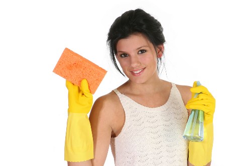 Routine rug maintenance with vacuuming and rotation in a home setting
