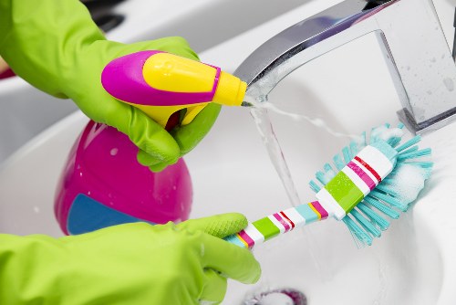 After builders cleaning checklist with tools and supplies