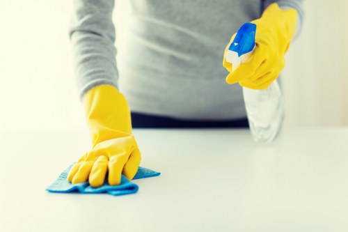 Floor cleaning and maintenance in a shared building corridor